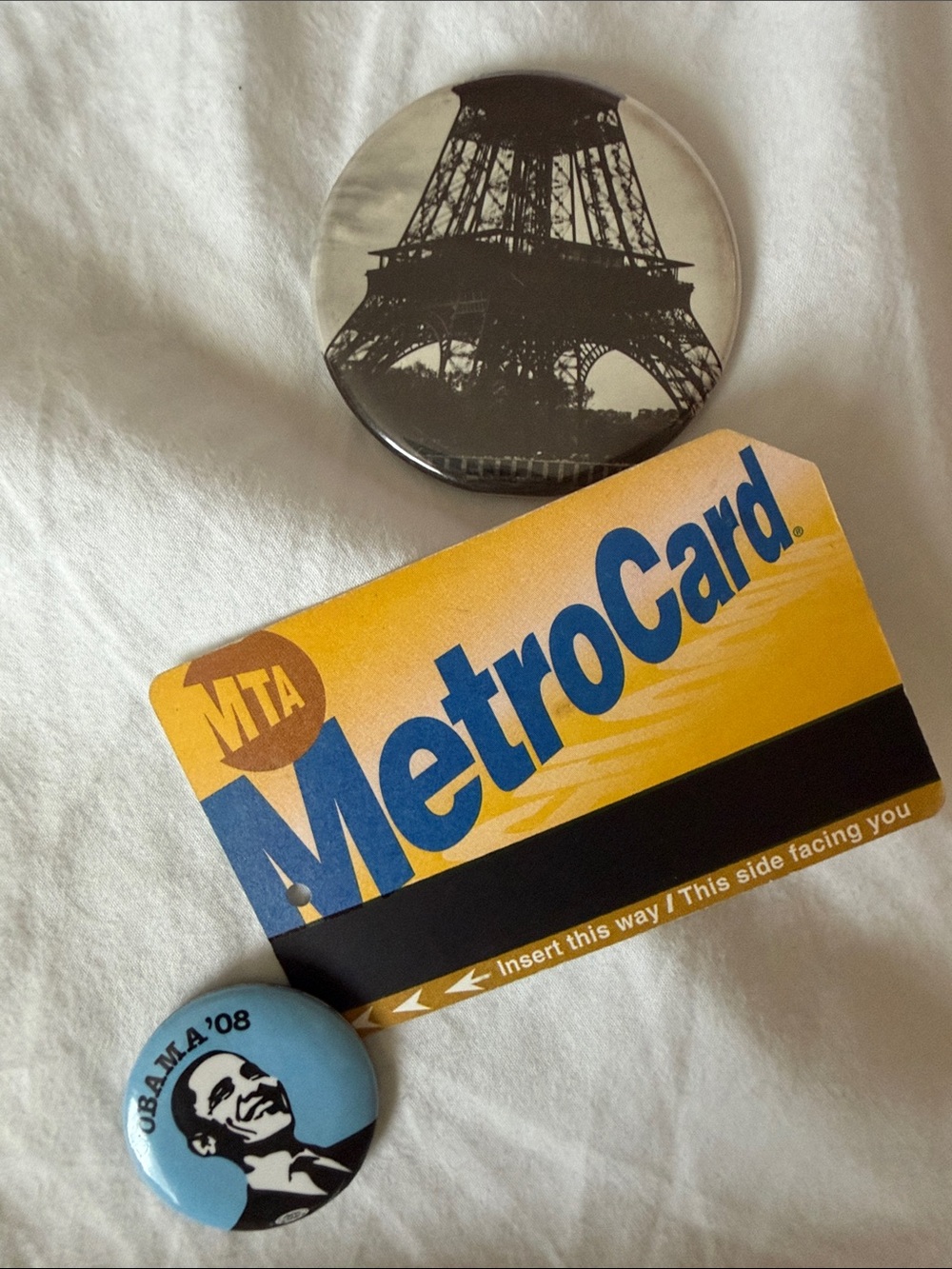 NYC Yellow & Blue MetroCard with Black Eiffel Tower and Light Blue Obama Pin